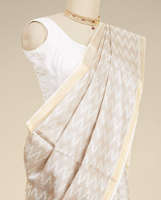 Cream zig zag striped design tusser silk saree with self zari border