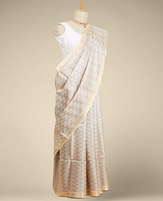 Cream zig zag striped design tusser silk saree with self zari border