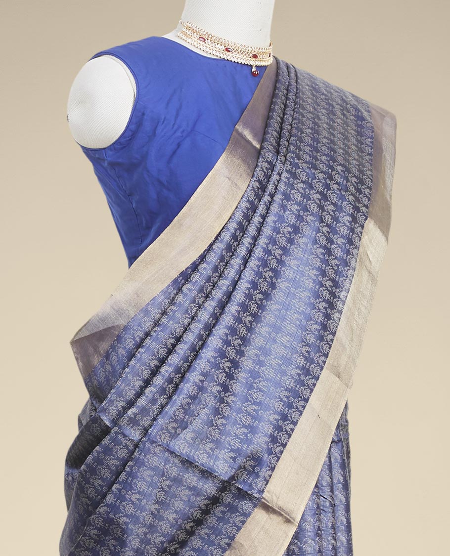 Blue  intricate zari design tusser silk saree with self-zari border
