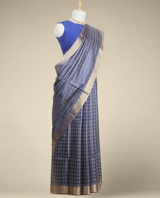 Blue  intricate zari design tusser silk saree with self-zari border