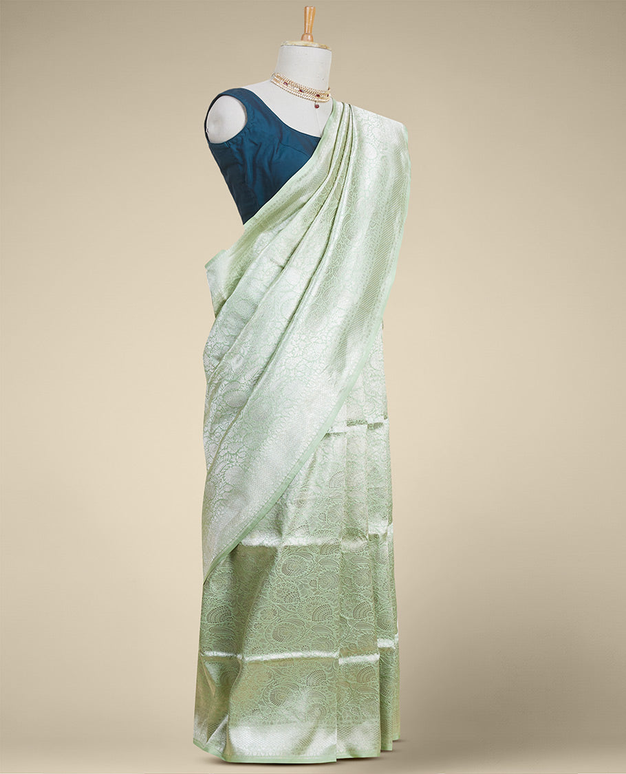 Green floral jacquard kathan silk saree with self-intricate zari border
