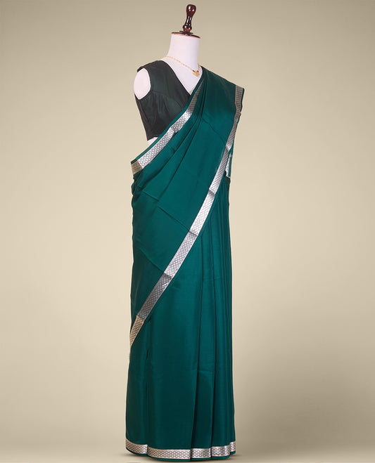 Green plain mysore silk saree with contrast zari design border