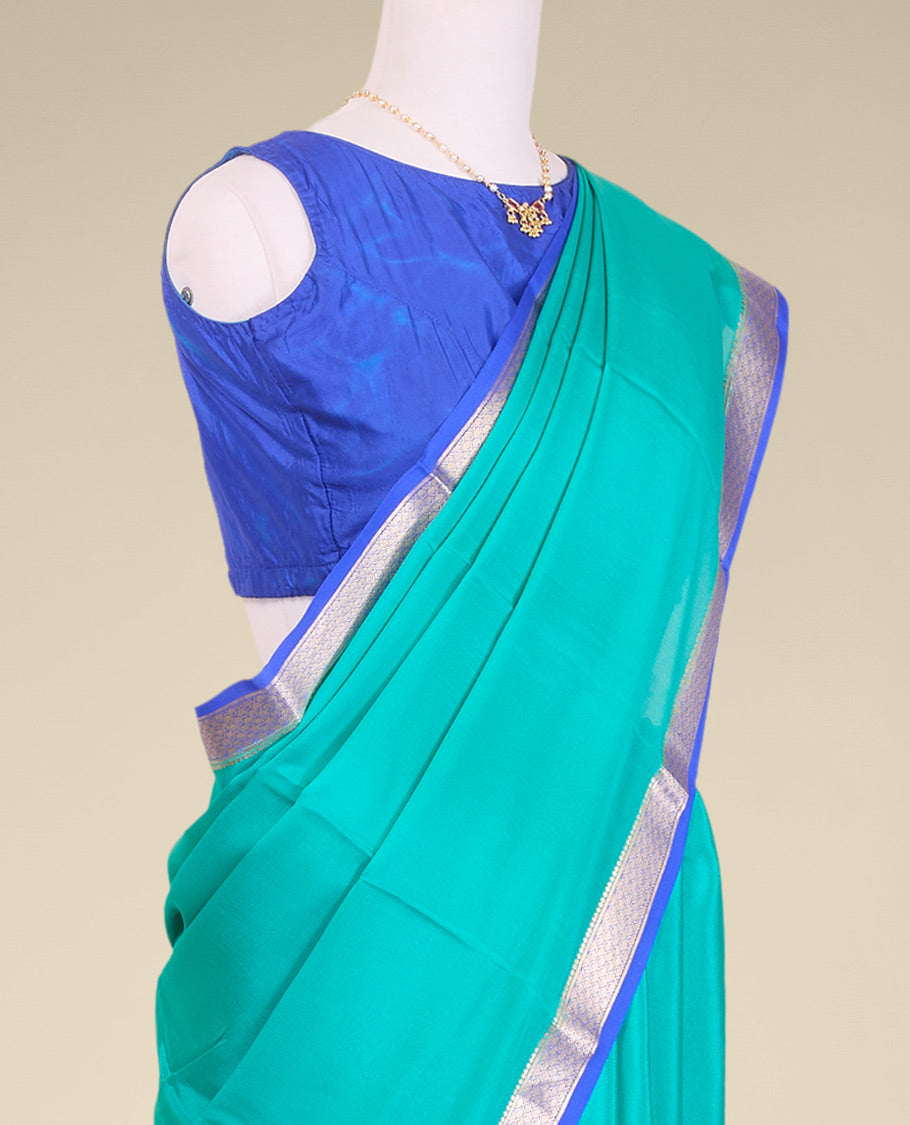 Blue plain mysore silk saree with self zari design border