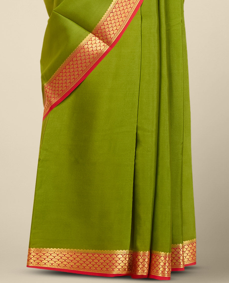 Green plain mysore silk saree with contrast zari design border