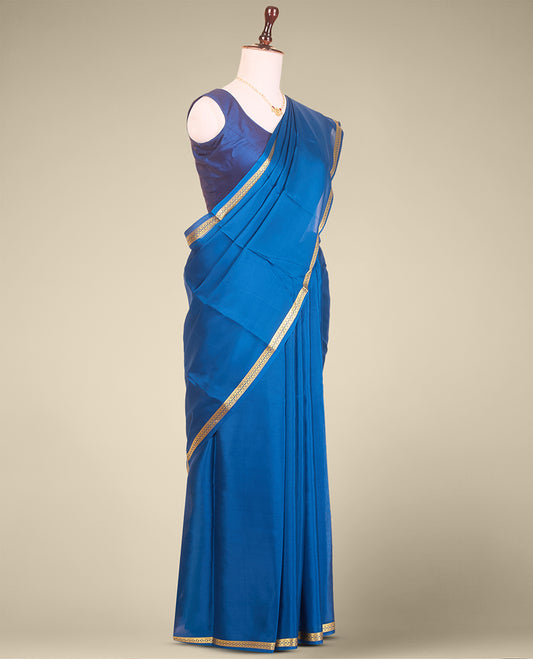 Blue plain mysore silk saree with self zari design border