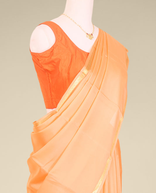 Orange plain mysore silk saree with self zari design border