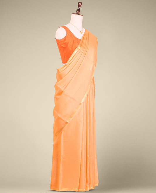Orange plain mysore silk saree with self zari design border
