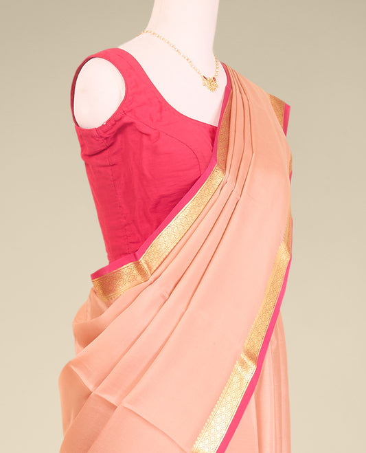 Beige plain mysore silk saree with contrast zari design border