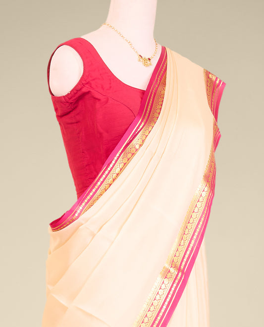 Cream plain mysore silk saree with contrast zari design border
