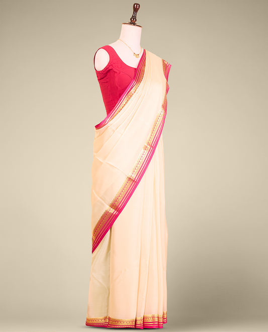 Cream plain mysore silk saree with contrast zari design border