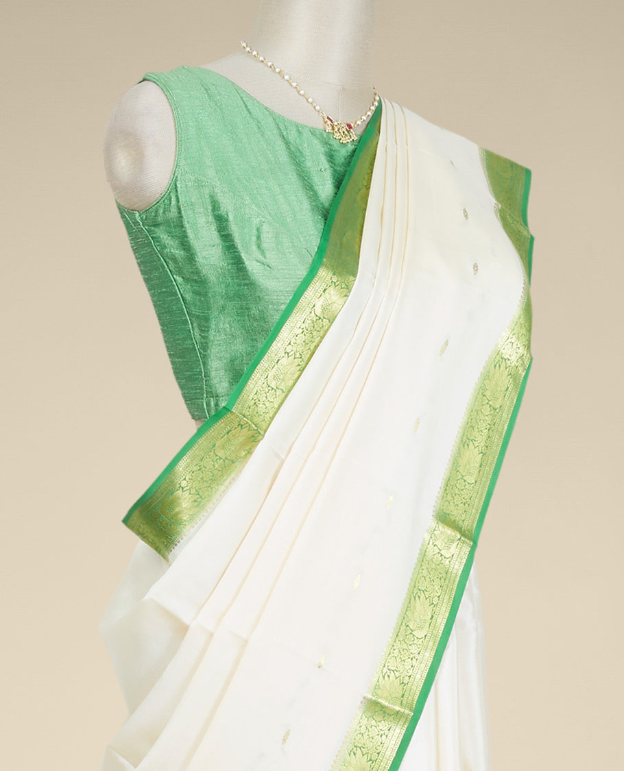 Cream floral buttas mysore silk saree with contrast floral zari design border