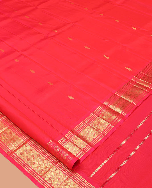 Red Kanchipuram Silk Saree, Decorated with Zari Buttas, Highlighted by a Zari Border of Panner Sombu, Banaras, Muthu, and Jaal Design, Pallu of Zari Design, and No Blouse