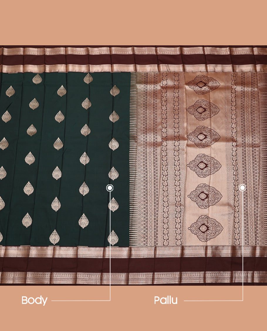 Deep Green Budget Silk Saree, Adorned with Thilakam-Shaped Buttas, Complemented by a Contrast Traditional Rettai Pettu Border, Grand Pallu, and a Contrast Blouse