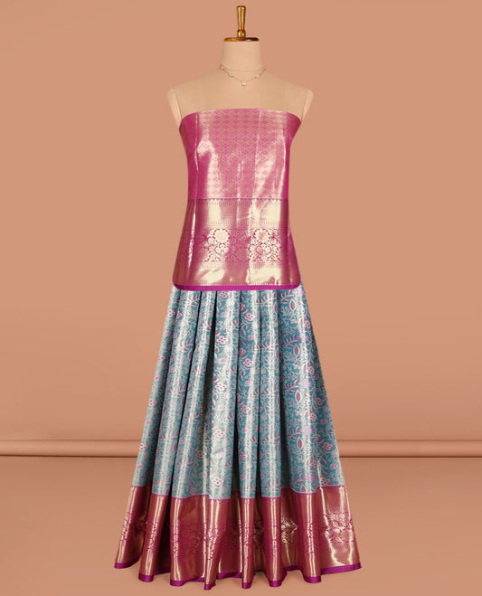 Blue Art Silk Pavadai Material Set, Richly Detailed with Floral Vine Jacquard on Its Skirt, Complemented by a Contrast Traditional Zari Border of Floral Creeper Designs, and Paired with a Contrast Jacquard Blouse