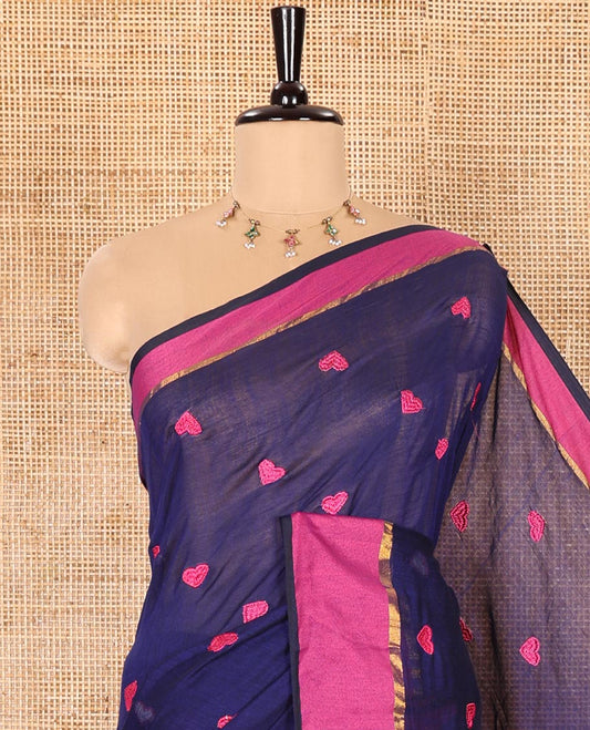 Navy Blue Khadi Mul Cotton Saree Prettified with Heart Motifs Embroidery All Over Its Body, Complemented by a Contrast Plain Border, Pallu Steeped with Heart Motifs Embroidery, and Paired with a Matching Blouse