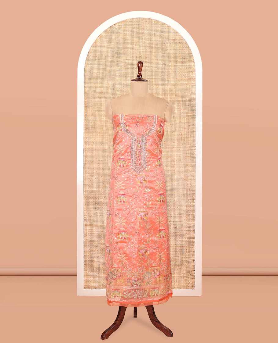 Fanta Orange Organza Material Churidar, Intricately Printed Outlined Embroidery Top, a Matching Bottom, and a Floral Embroidered Dupatta