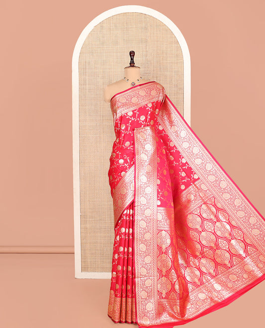 Red Banarasi Nylon Saree, Spotlighted with Floral Jaal Jacquard, a Floral Creeper Zari Border, Intricate Pallu, and a Matching Blouse