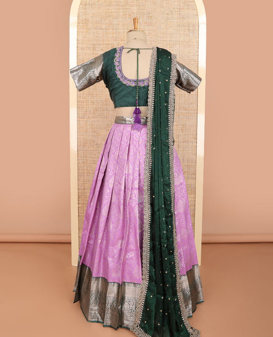 Light pink floral jacquard half saree with contrast zari design border, floral embroidered blouse & floral embroidery dhavani