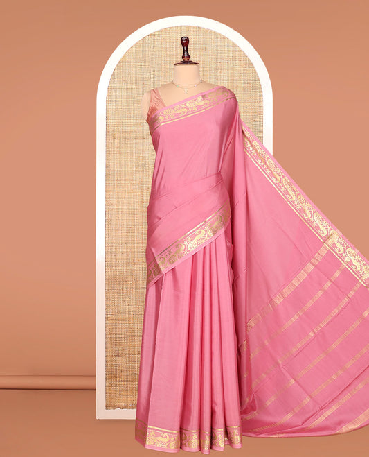 Pink Plain Mysore Silk Saree, Highlighted by a Traditional Zari Border of Peacock Designs, Pallu Woven with Zari Stripes, and Paired with a Matching Blouse