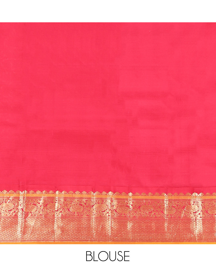 Royal Blue Vasundhara Silk Saree, Decorated with Zari Buttas, a Contrast Border of Thilakam Mokku, Muthu, Banaras, Kodi Visiry, and Mayil Kann Designs, Grand Pallu, and a Contrast Blouse