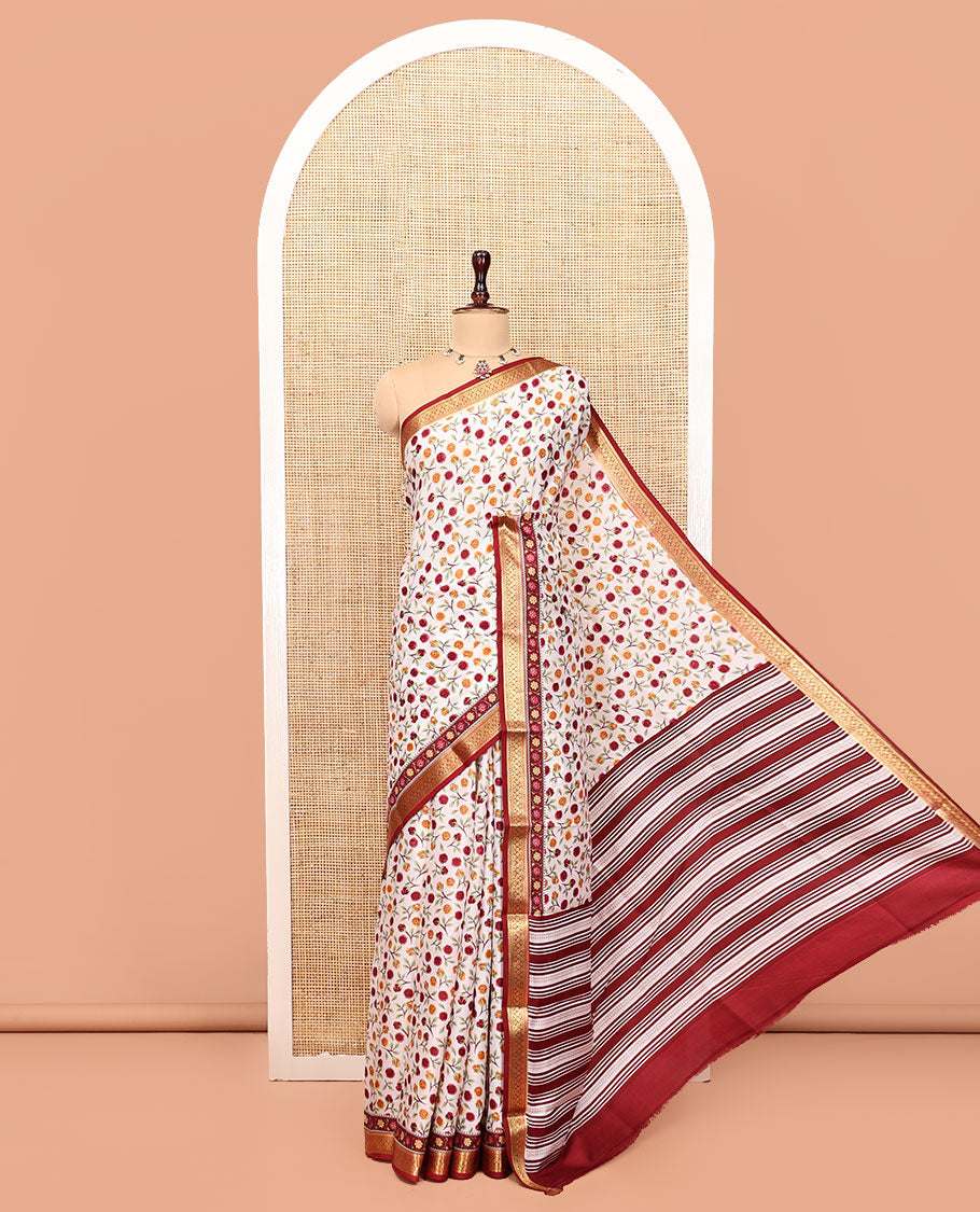 Cream Printed Silk Saree Beautified with a Floral Print, Contrast Traditional Zari Border, Striped Pallu, and Contrast Blouse