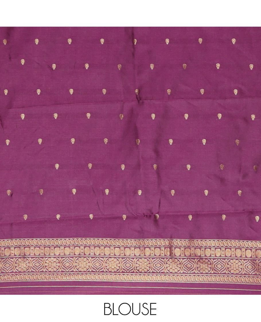 Dusky Purple Kanchi Silk Saree, Artfully Detailed with Floral Zari Buttas All Over Its Body, Complemented by Contrast Floral Design Border, Intricately Designed Pallu, and Paired with a Contrast Blouse