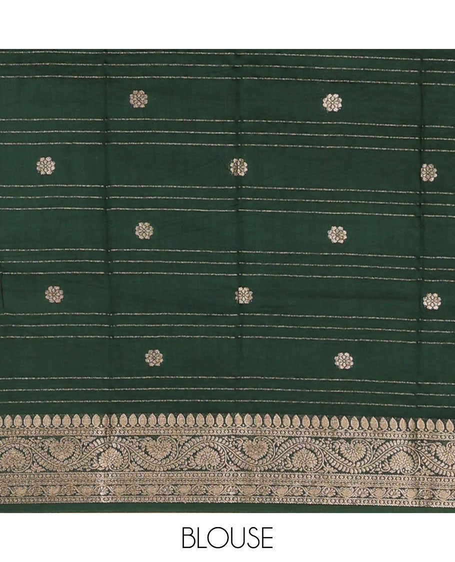 Red Assam Silk Saree, Embellished with Zari Stripes and Zari Buttas, Complemented by Contrast Zari Border of Floral Creeper Designs, Pallu Depicts Zari Designs, and Paired with a Contrast Blouse