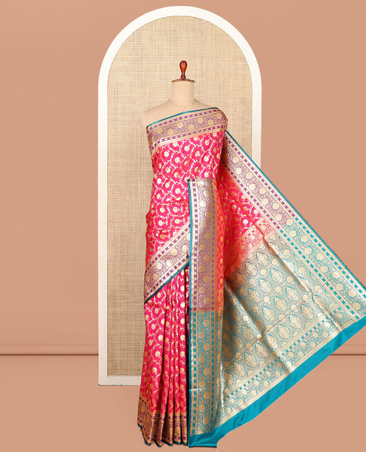 Pink Semi-Banaras Saree, Impeccably Styled with Floral Jaal Jacquard on Its Body, Complemented by a Contrast Floral Creeper Design Border, Intricately Designed Pallu, and Paired with a Contrast Blouse