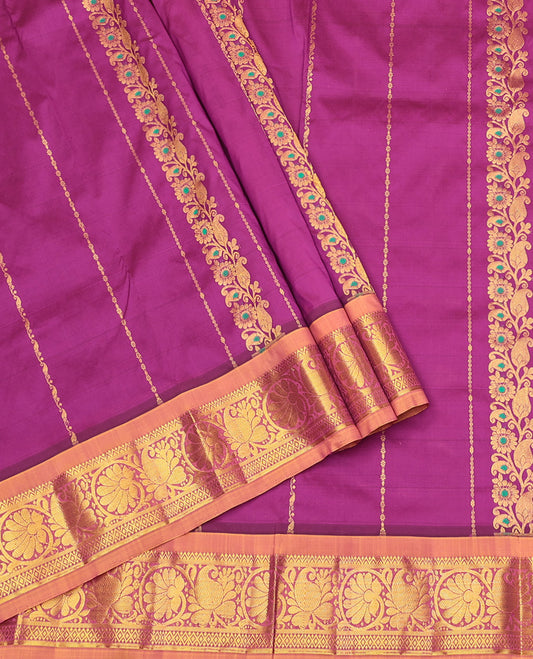 Purple Art Silk Pavadai Material Set, Embellished with Zari Designs on Its Skirt, Complemented by a Contrast Paisley-Floral Zari Border, and a Matching Blouse