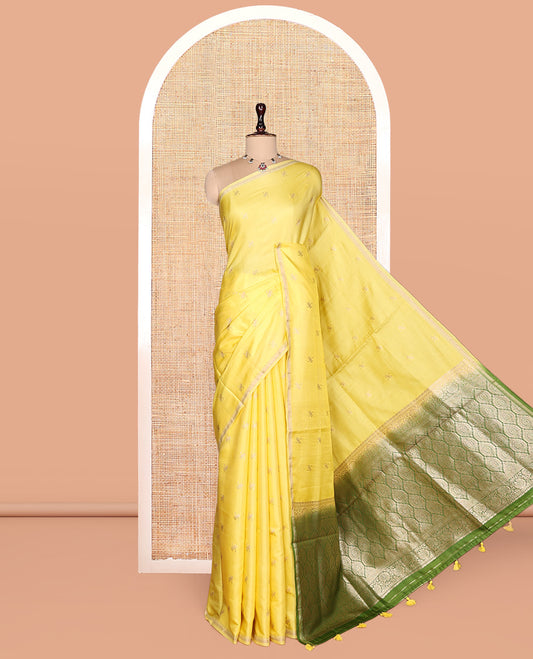 Light Yellow Satin Silk Saree, Subtly Sparkled with Zari Buttas, a Subtle Piping Border, Complemented by a Contrast Intricately Designed Pallu, and a Contrast Blouse