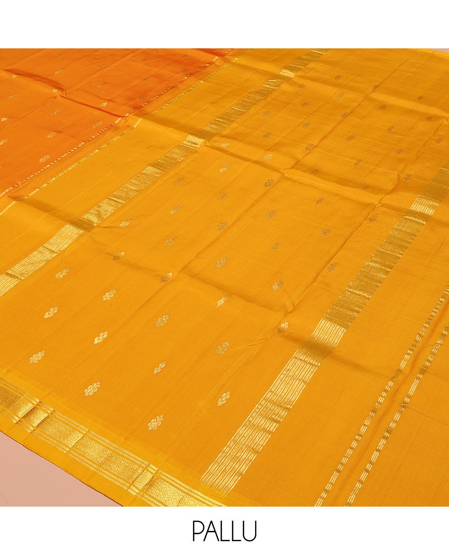 Orange Kanchipuram Silk Saree, Bedecked with Zari Buttas on Its Body, Complemented by a Contrast Zari One-Sided Border of Banaras, and Jaal Designs, Pallu of Zari Designs, and Comes Without a Blouse