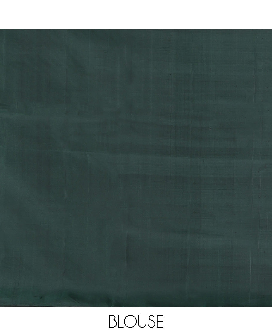 Borderless Green Mayuri Lite Silk Mix Saree, Detailed with Bird Buttas All Over Its Body, Highlighted by a Zari Pallu of Diagonal Stripes and Chakram Designs, and Paired with a Matching Blouse