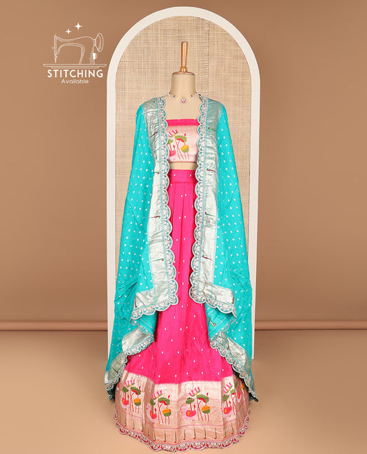 Pink buttas banaras half saree with contrast animal design border, zari design blouse & floral design dhavani