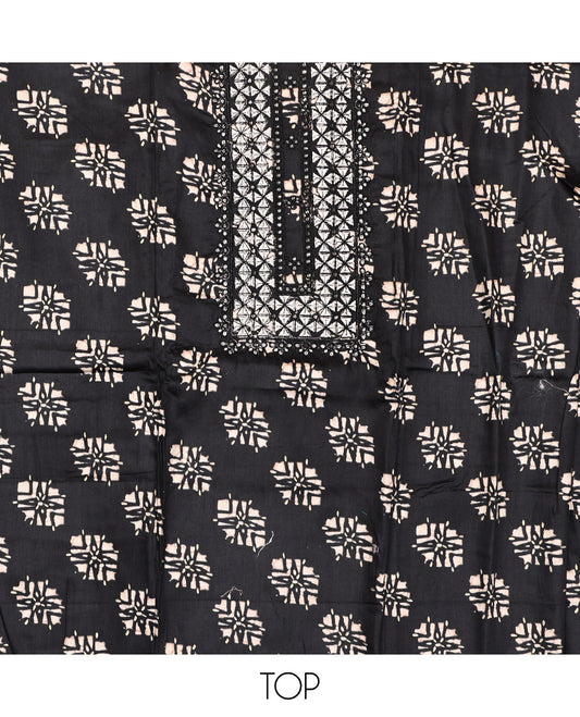 Black Material Chudidar Set, Richly Detailed with Unique Motifs Block Printed and Embroidered on Rayon Top, a Contrast Plain Cotton Bottom, and Paired with a Batik-Style Geometric Printed Chiffon Dupatta
