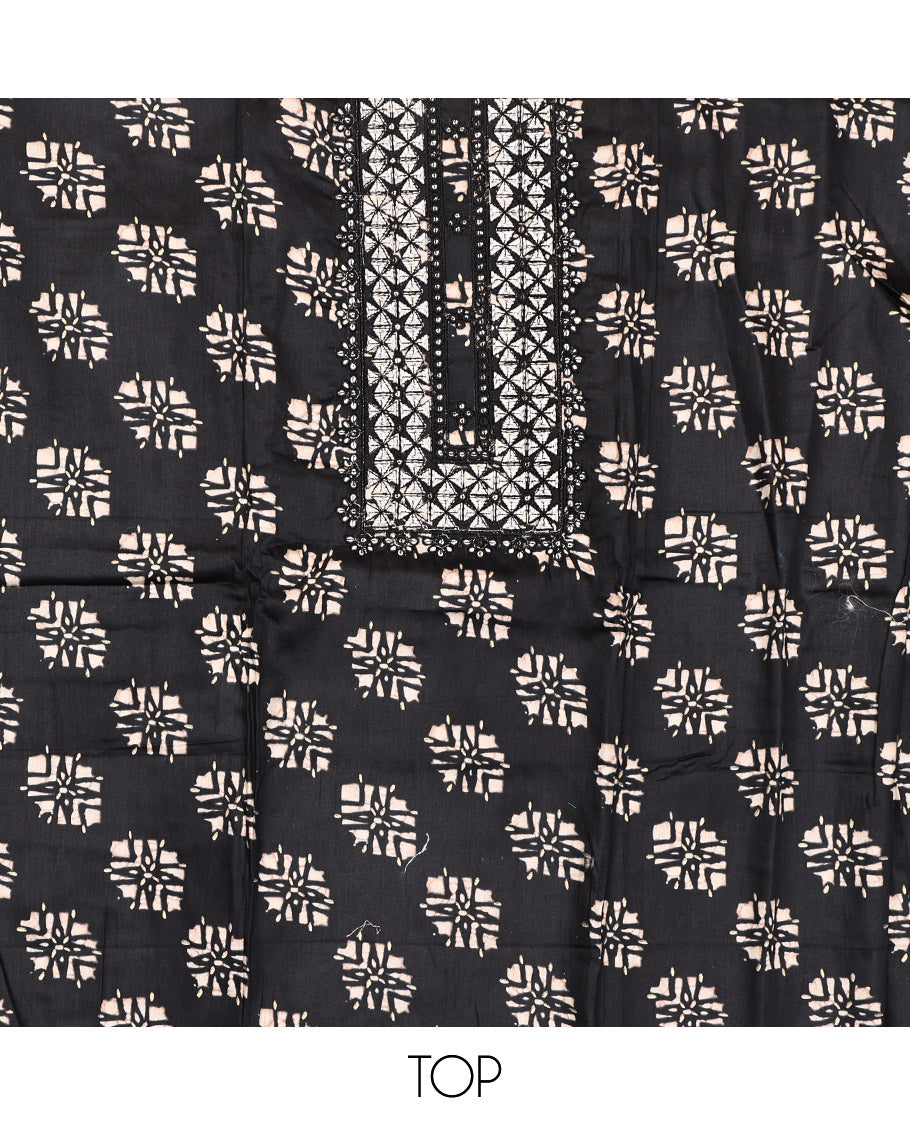 Black Material Chudidar Set, Richly Detailed with Unique Motifs Block Printed and Embroidered on Rayon Top, a Contrast Plain Cotton Bottom, and Paired with a Batik-Style Geometric Printed Chiffon Dupatta