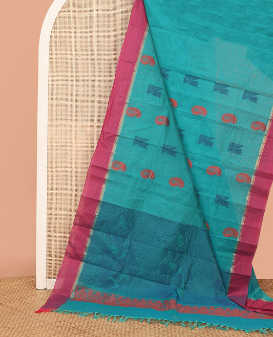 Blue Kanchi Cotton Saree, Sparsely Woven with Thread Buttas All Over Its Body, Complemented by a Contrast Border, Pallu Features Human Figurines, and Paired with a Matching Blouse