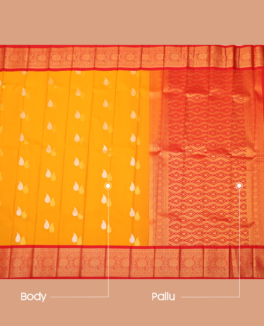 Yellow Budget Silk Saree, Ornamented with Leaf Buttas All Over Its Body, Complemented by a Contrast Traditional Zari Border, Grand Ogee Patterned Pallu, and Paired with a Contrast Blouse