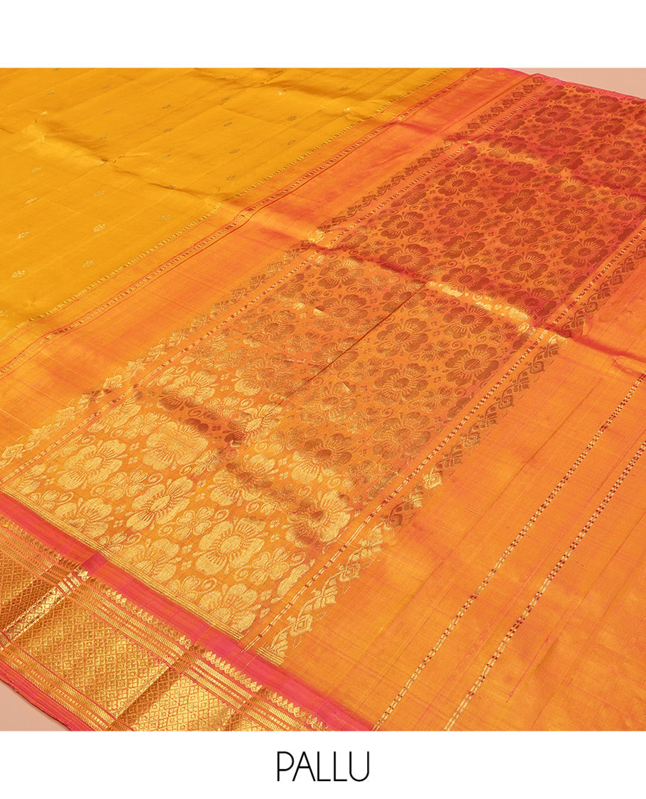 Orange Kanchipuram Silk Saree, Subtly Woven with Zari Buttas, Complemented by Contrast One-Sided Border of Thilakam Mokku, Banaras, Muthu, and Jaal Designs, Zari Design Pallu, and No Blouse