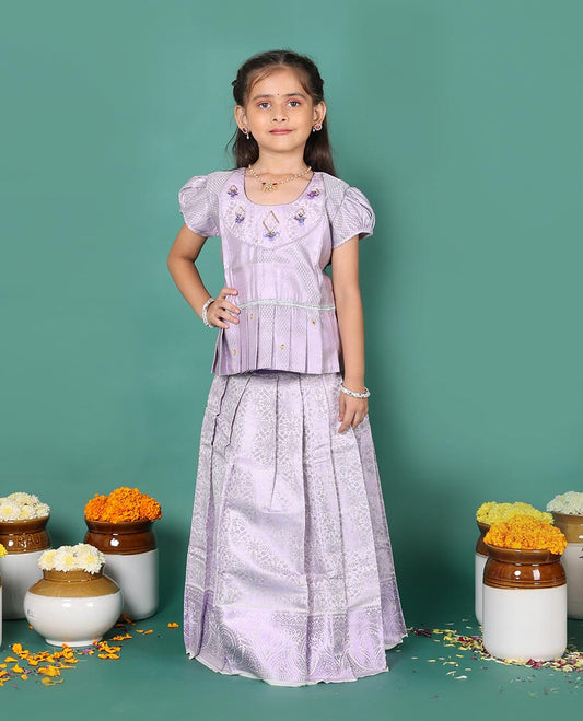 Lavender art silk readymade pavadai set, jacquard with traditional zari border skirt, and jacquard embroidered puff-sleeve blouse