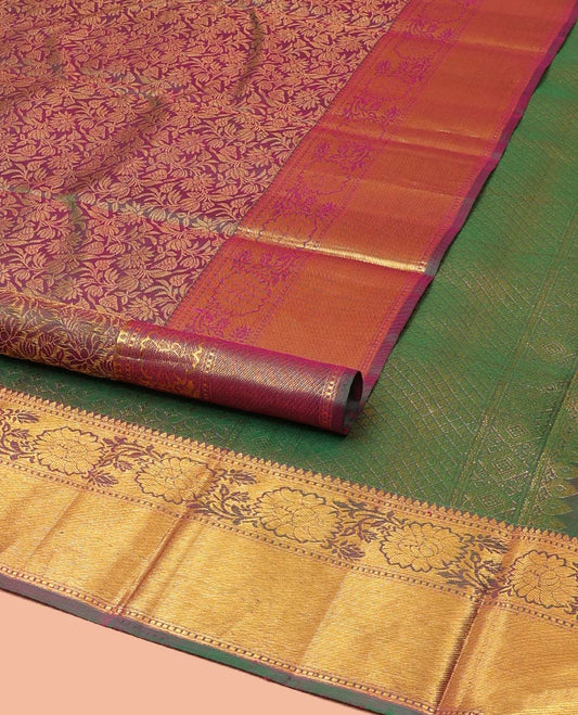Purple Kanchipuram Wedding Silk Saree, Opulently Embellished with Jacquard Design on Its Body, Highlighted by Zari Border of Rekku, Muthu, and Kodi Visiry Designs, Intricately Designed Pallu and Paired with a Matching Blouse