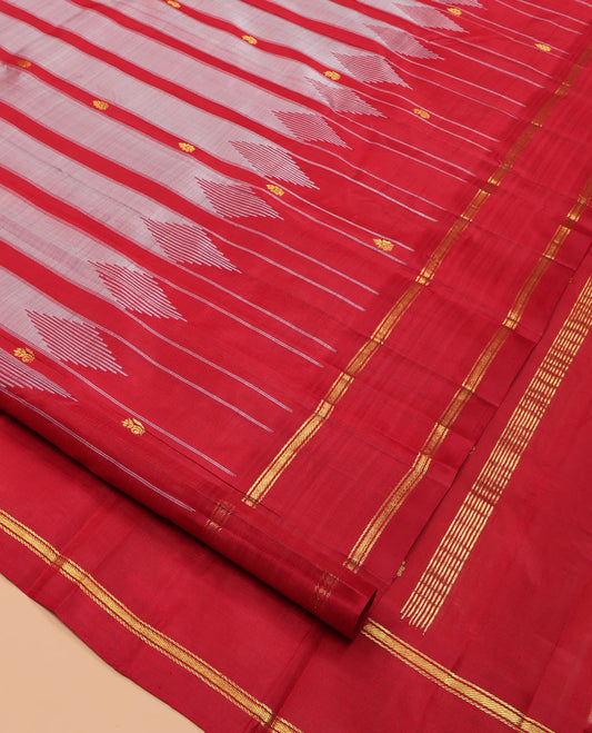 Grey Kanchipuram Silk Saree Featuring Zari Buttas, Complemented by a Contrast One-Sided Thazampoo Rekku Rettai Pettu Border, Zari Design Pallu, and a No Blouse