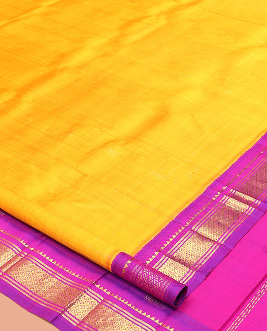 Yellow Kanchipuram Silk Saree, Delicately Woven with Zari Buttas, a Contrast One-Sided Korvai Border of Rekku, Banaras, and Jaal Designs, a Zari Design Pallu, and No Blouse