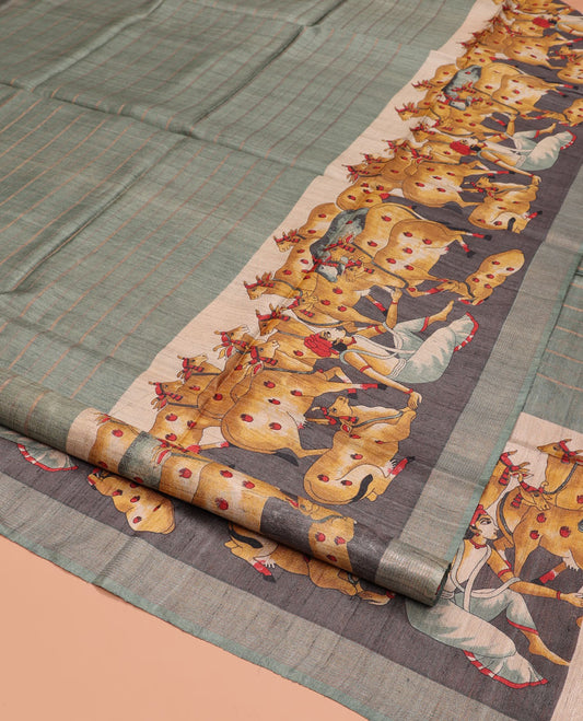 Green Tussar Silk Saree, Subtly Sparkled with Stripes, Complemented by a Contrast Pichwai Cow Border, Printed Pallu, and a Matching Blouse