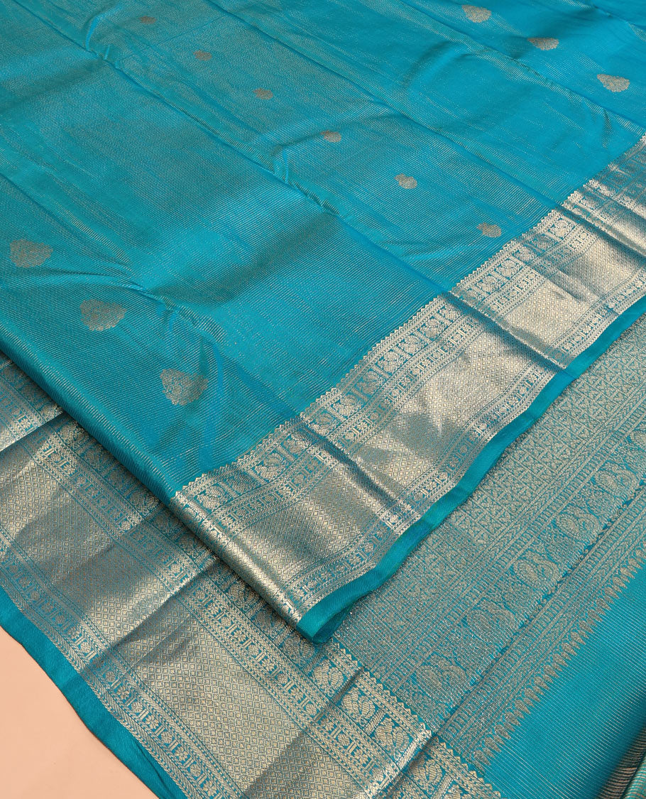 Blue Vasundhara Silk Saree, Woven with Zari Buttas and Vaira Oosi Stripes, a Traditional Zari Border, Grand Pallu, and a Matching Blouse