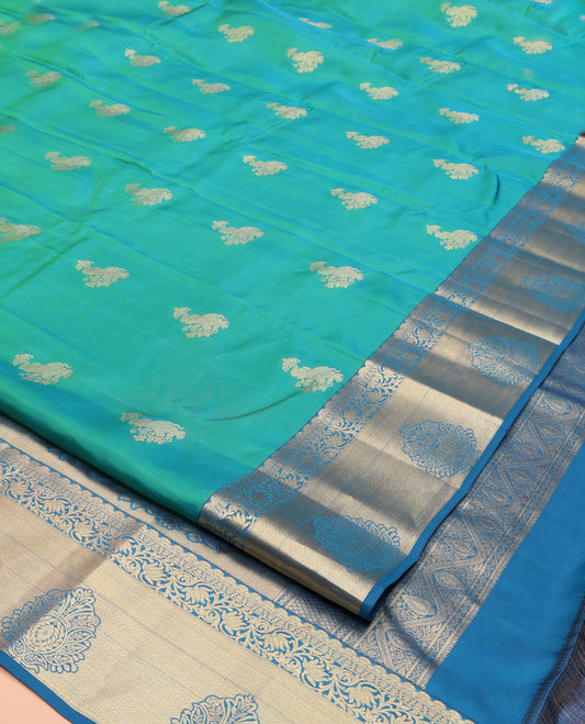 Green Vasundhara Lite Silk Mix Saree, Prettified with Zari Buttas on Its Body, Complemented by a Contrast Traditional Zari Border, Pallu of Floral Designs, and Paired with a Contrast Blouse