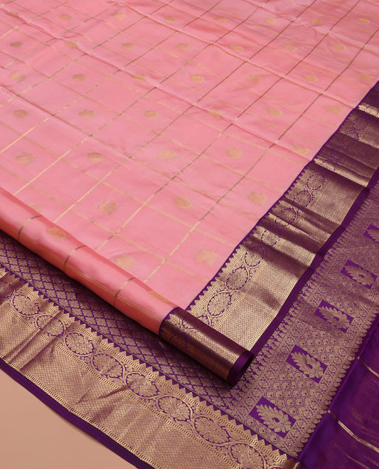 Pink Vasundhara Silk Saree, Entralled with Zari Butta Enclosed Checks On Its Body, Complemented by Contrast Border of Rekku, Muthu, Kodi Visiry, and Mayil Kann Designs, Grand Jaal Pallu and Paired with a Contrast Blouse
