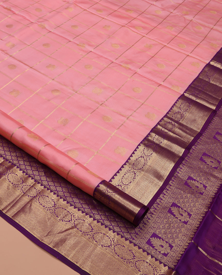Pink Vasundhara Silk Saree, Entralled with Zari Butta Enclosed Checks On Its Body, Complemented by Contrast Border of Rekku, Muthu, Kodi Visiry, and Mayil Kann Designs, Grand Jaal Pallu and Paired with a Contrast Blouse