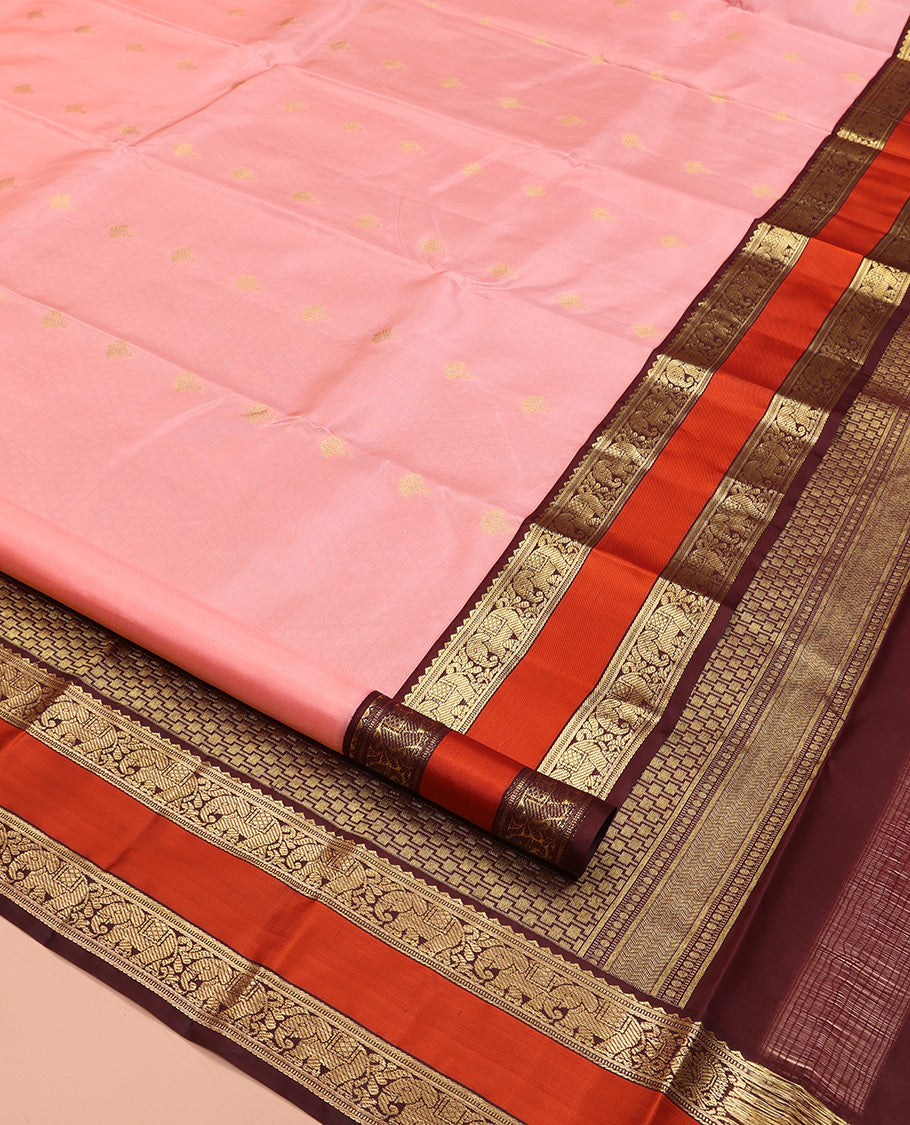 Pink Vasundhara Silk Saree, Sparsely Sparkled with Zari Buttas All Over Its Body, Complemented by a Contrast Rettai Pettu Border of Rekku, Muthu, and Yaanai Designs, Grand Geometric Pallu, and Paired with a Contrast Blouse