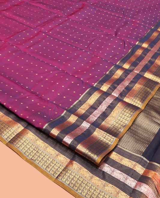 Magenta Vasundhara Lite Silk Mix Saree, Ornamented with Zari Buttas, Complemented by a Contrast Border of Yaali and Mayil Designs, Zari Design Pallu, and a Contrast Blouse