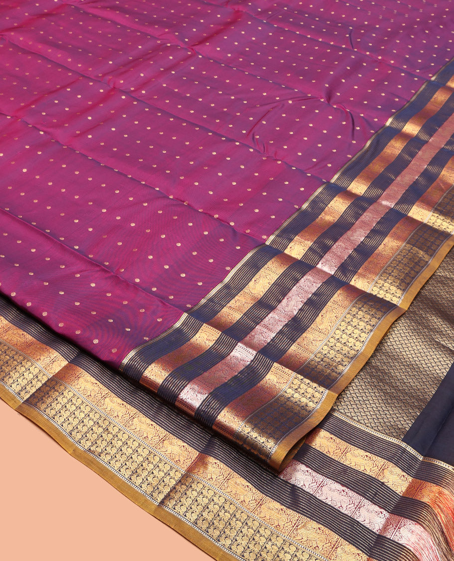 Magenta Vasundhara Lite Silk Mix Saree, Ornamented with Zari Buttas, Complemented by a Contrast Border of Yaali and Mayil Designs, Zari Design Pallu, and a Contrast Blouse